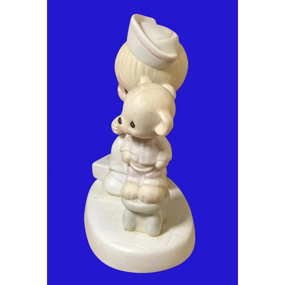 Precious Moments Love Beareth All Things Figurine E-7158 Nurse and Bear